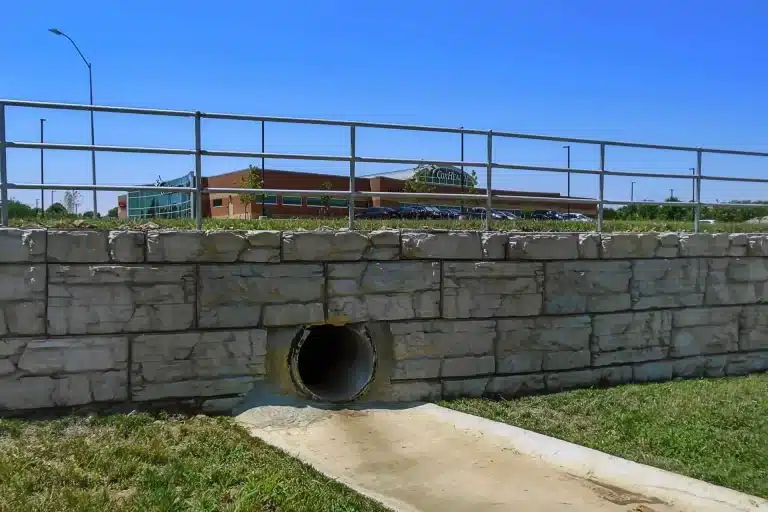 Retaining Walls and Water Management: Preventing Flooding and Drainage Issues